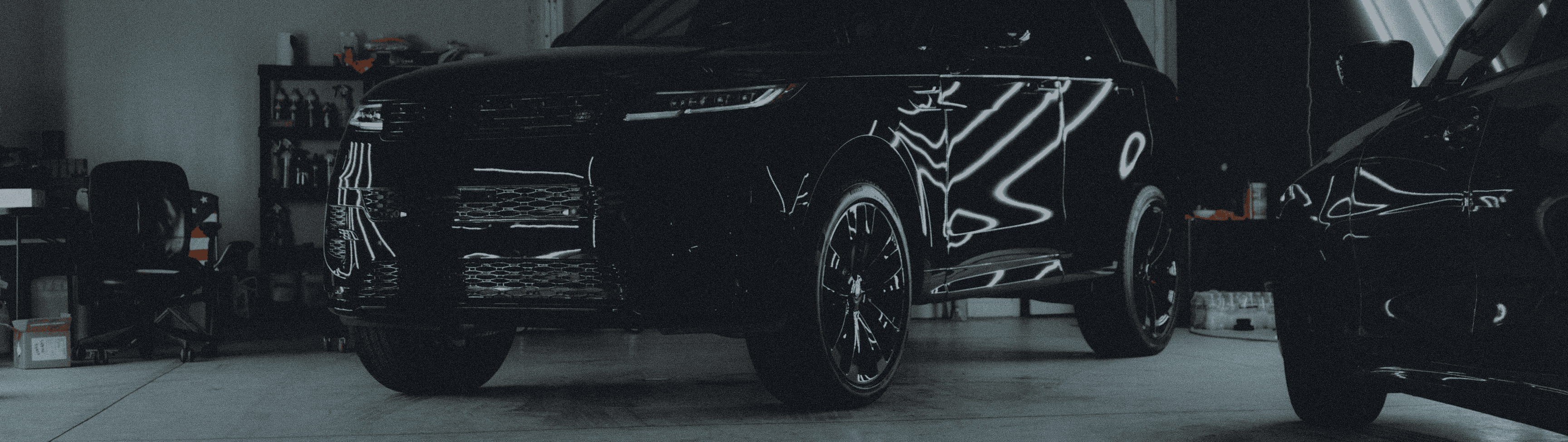 Luxury cars in garage