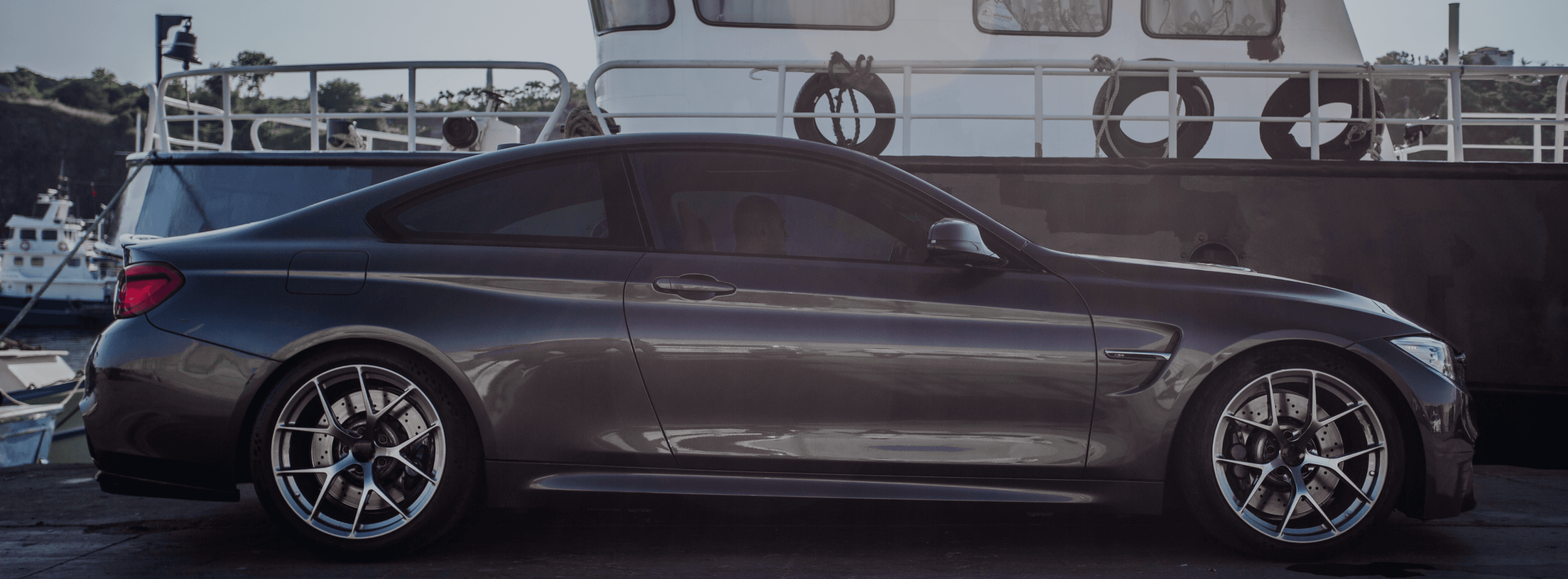 Premium car at harbor